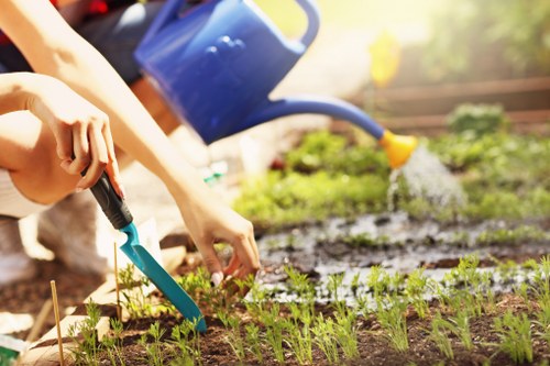 Gardeners working at a green waste collection point in Woolwich